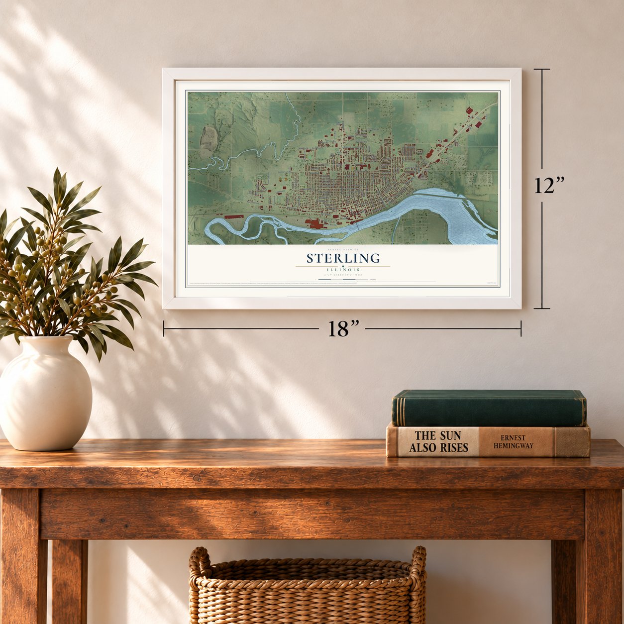 Sterling, Illinois map, 12 x 18 inch print in a white frame in an entryway
