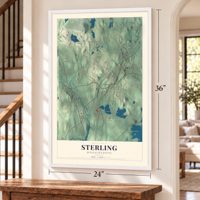 Sterling, Massachusetts map, 24 x 36 inch print in a white frame by a staircase