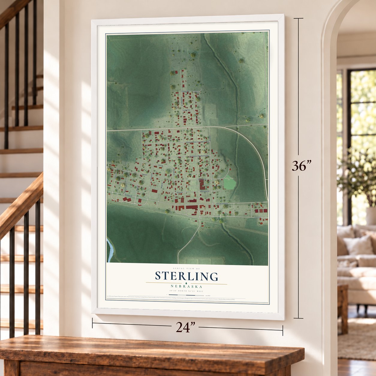 Sterling, Nebraska map, 24 x 36 inch print in a white frame by a staircase