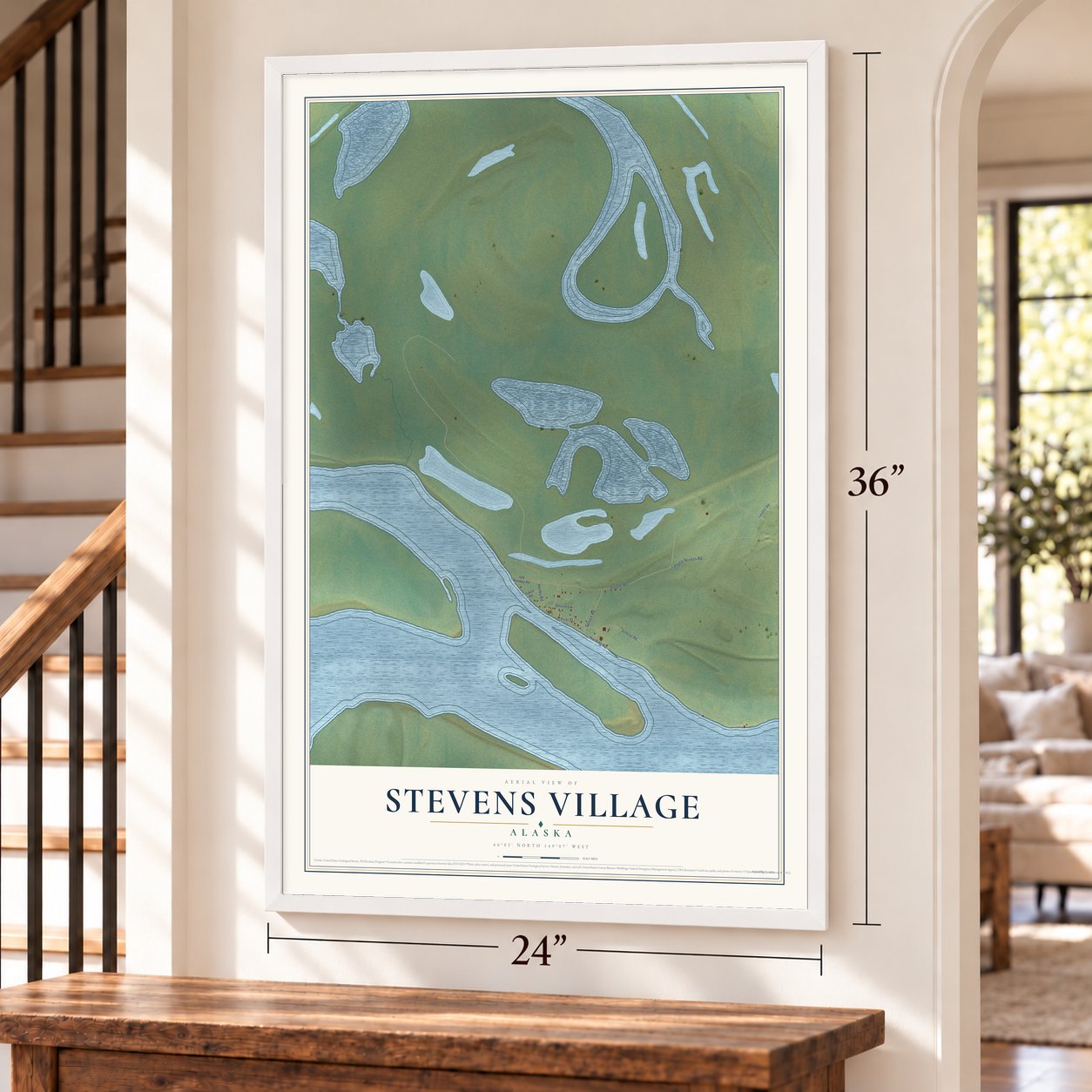 Stevens Village, Alaska map, 24 x 36 inch print in a white frame by a staircase
