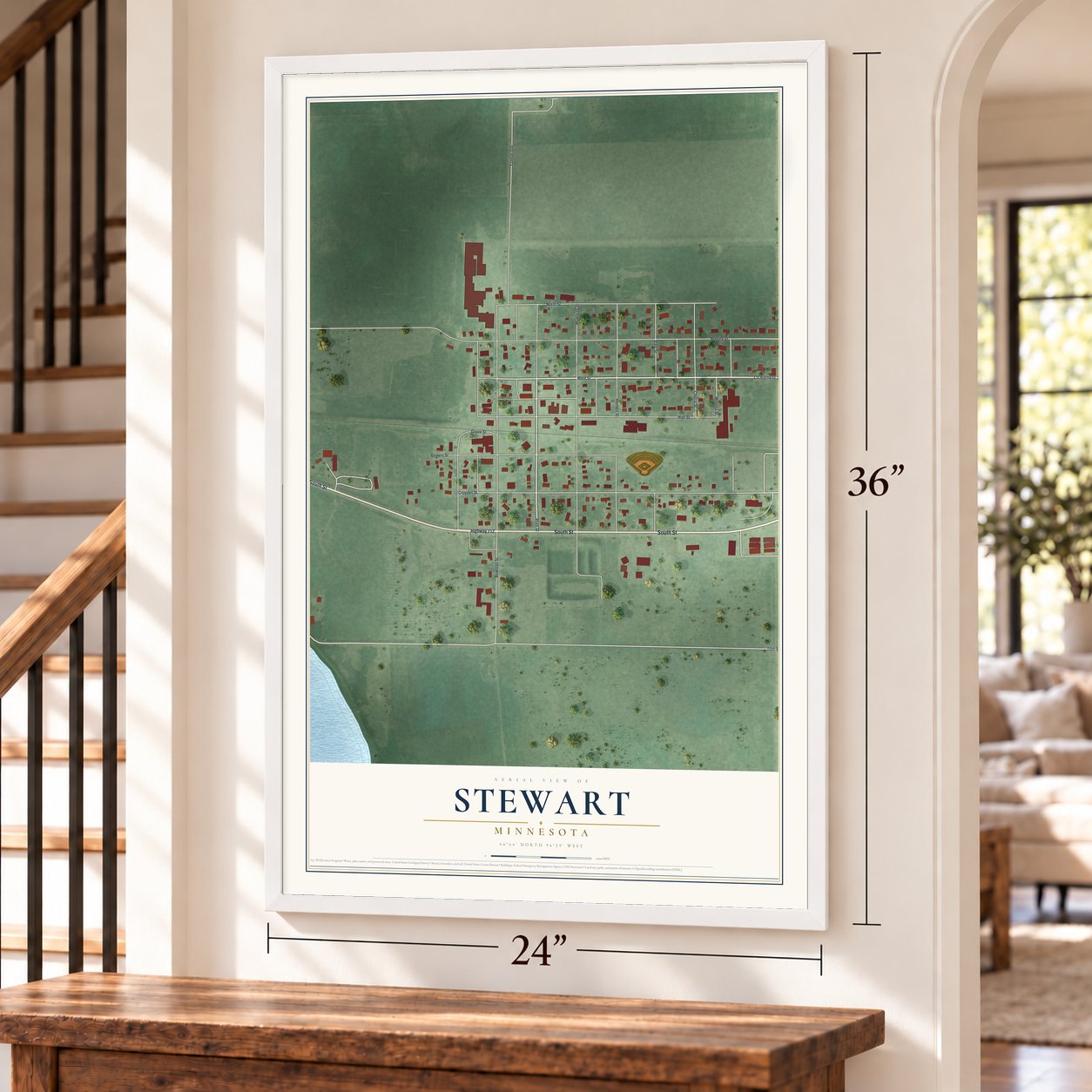 Stewart, Minnesota map, 24 x 36 inch print in a white frame by a staircase