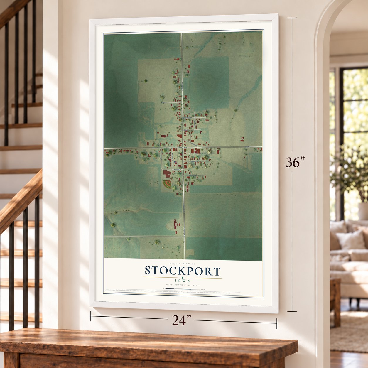 Stockport, Iowa map, 24 x 36 inch print in a white frame by a staircase