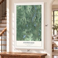 Stoddard, New Hampshire map, 24 x 36 inch print in a white frame by a staircase