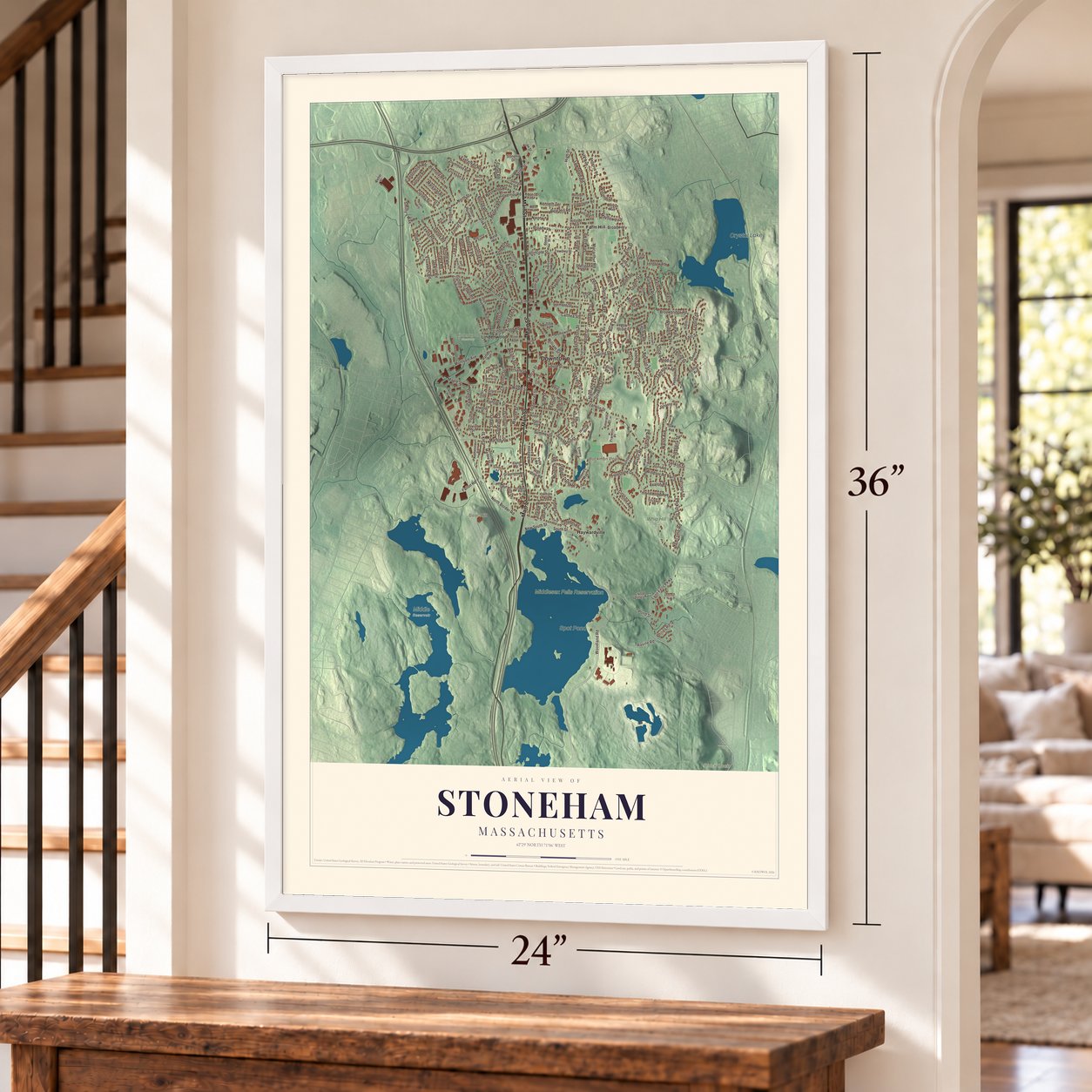 Stoneham, Massachusetts map, 24 x 36 inch print in a white frame by a staircase