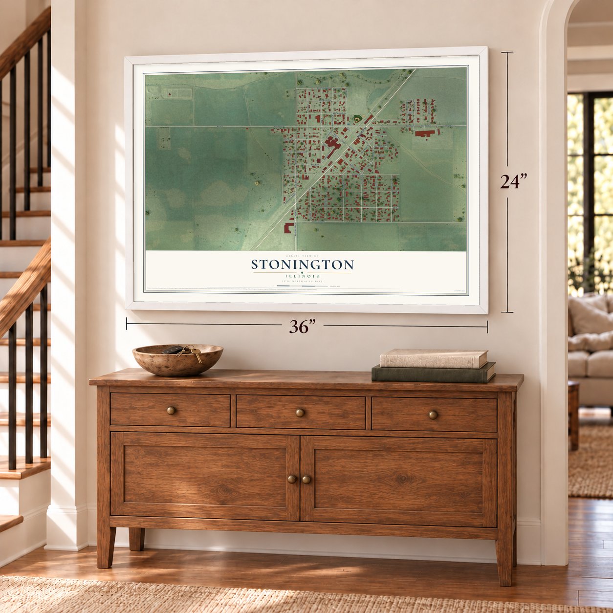 Stonington, Illinois map, 24 x 36 inch print in a white frame above a dresser by a staircase