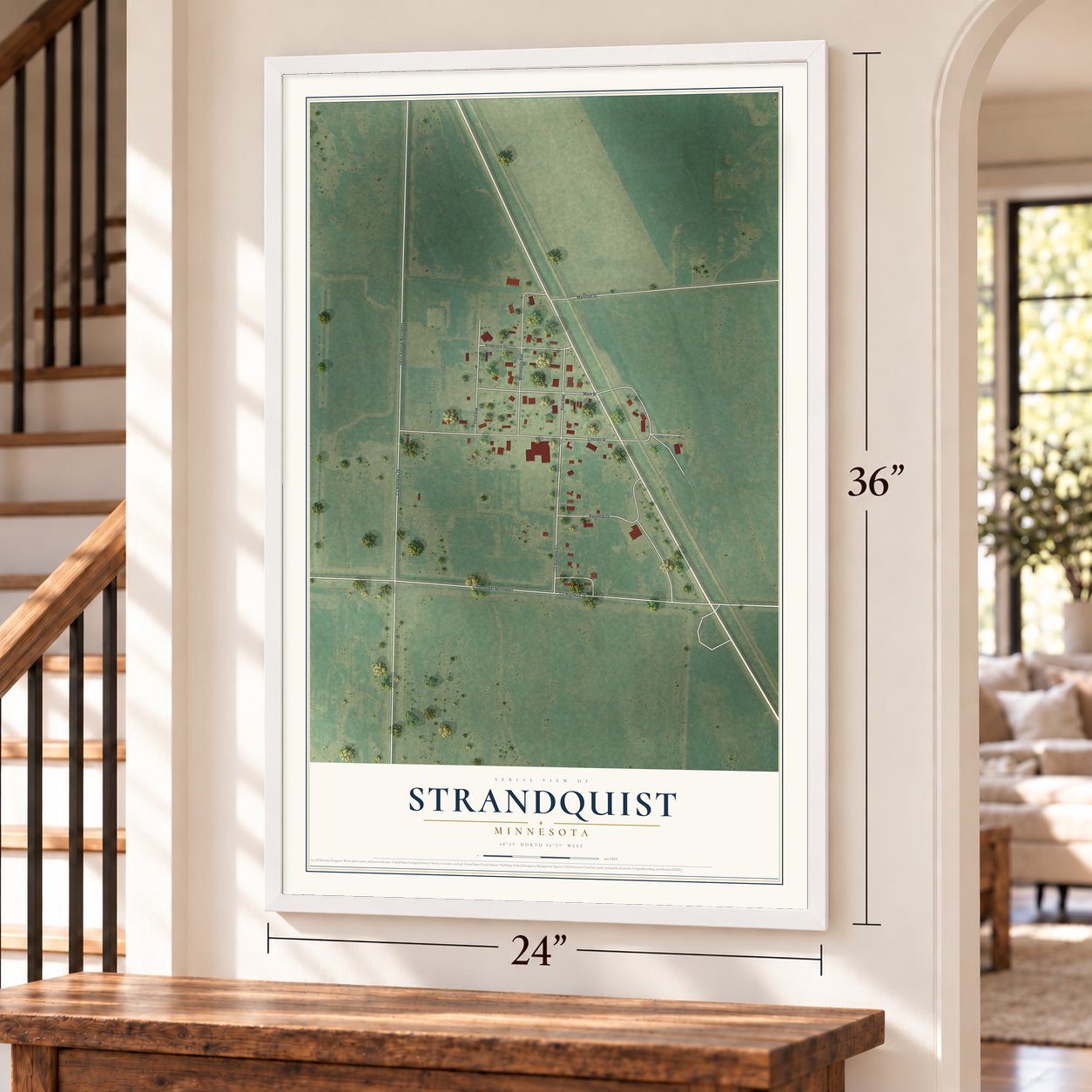 Strandquist, Minnesota map, 24 x 36 inch print in a white frame by a staircase