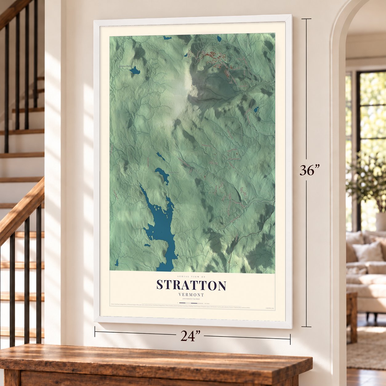 Stratton, Vermont map, 24 x 36 inch print in a white frame by a staircase