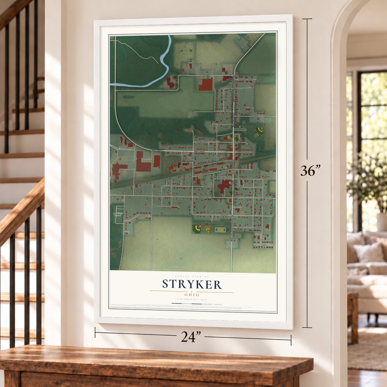 Stryker, Ohio map, 24 x 36 inch print in a white frame by a staircase