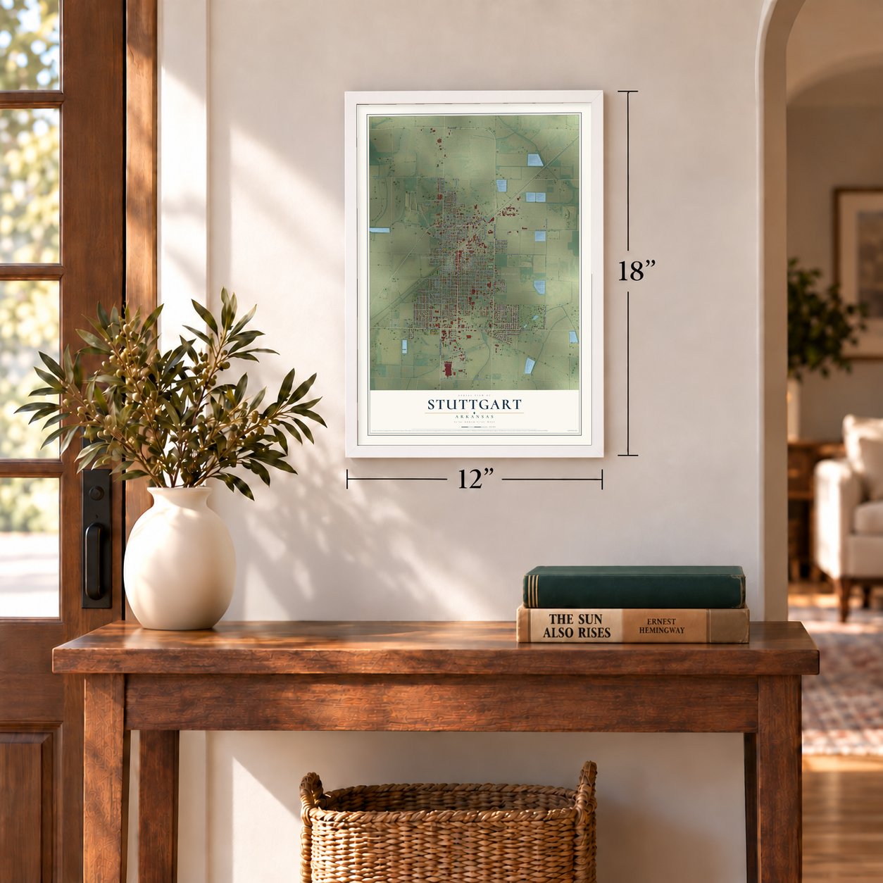 Stuttgart, Arkansas map, 12 x 18 inch print in a white frame in an entryway