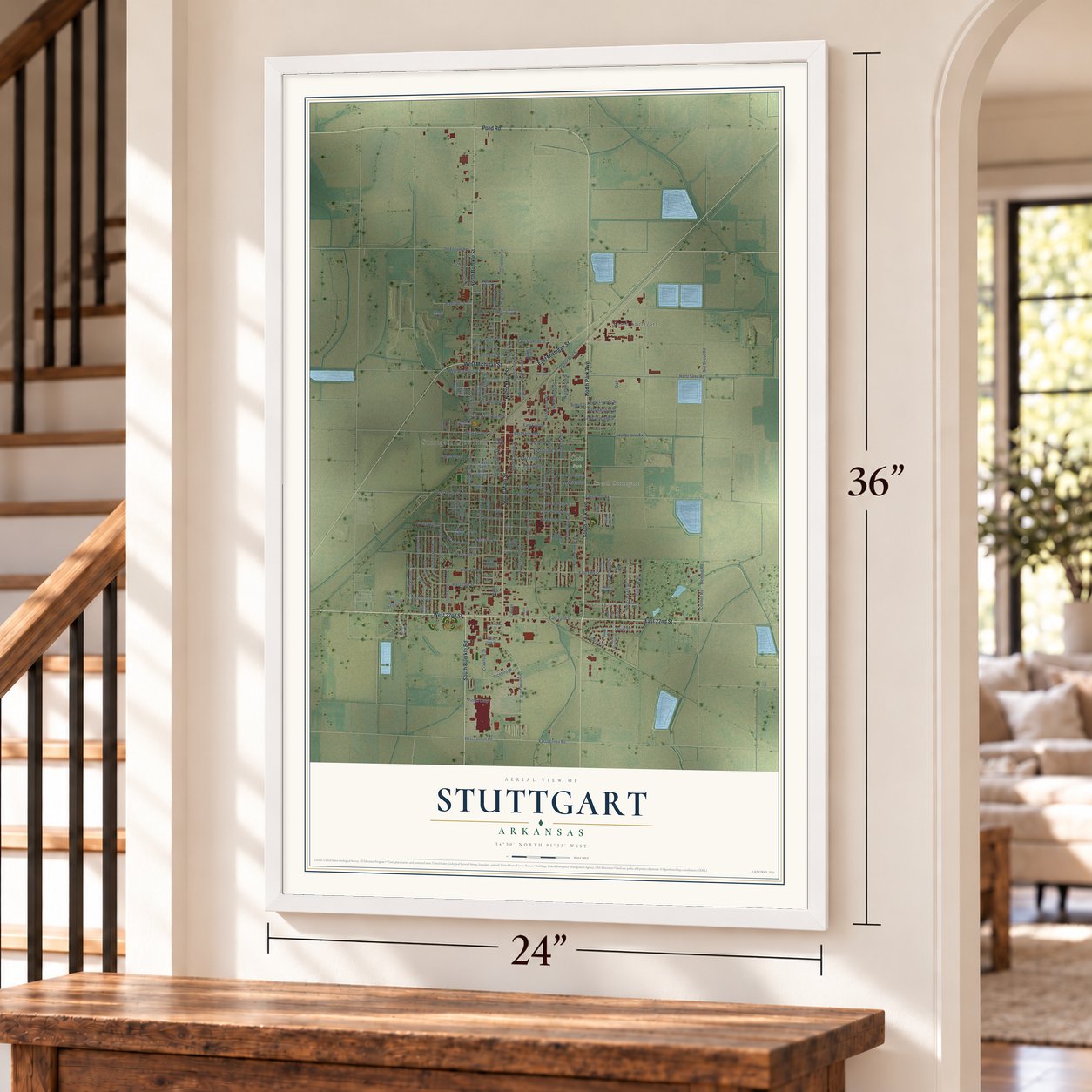 Stuttgart, Arkansas map, 24 x 36 inch print in a white frame by a staircase