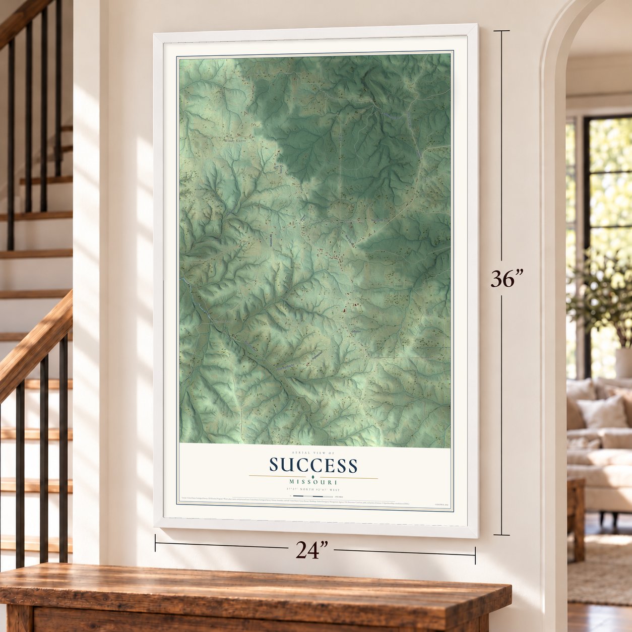 Success, Missouri map, 24 x 36 inch print in a white frame by a staircase