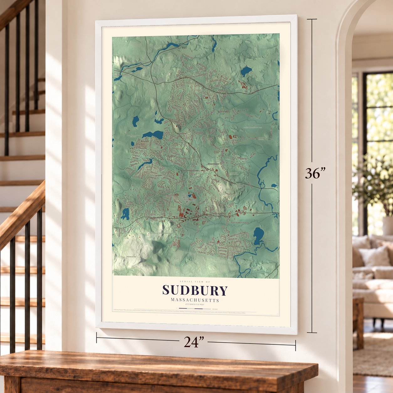 Sudbury, Massachusetts map, 24 x 36 inch print in a white frame by a staircase