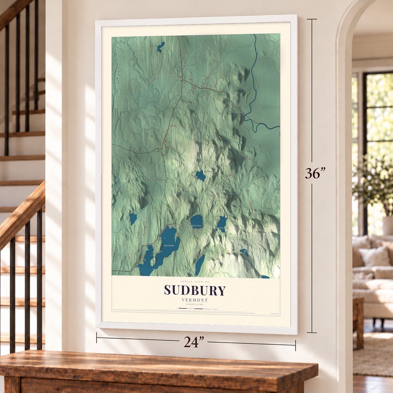 Sudbury, Vermont map, 24 x 36 inch print in a white frame by a staircase