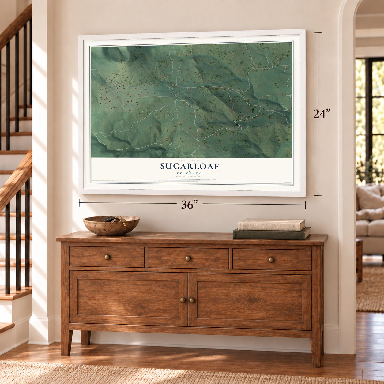 Sugarloaf, Colorado map, 24 x 36 inch print in a white frame above a dresser by a staircase