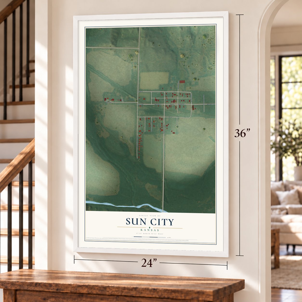 Sun City, Kansas map, 24 x 36 inch print in a white frame by a staircase