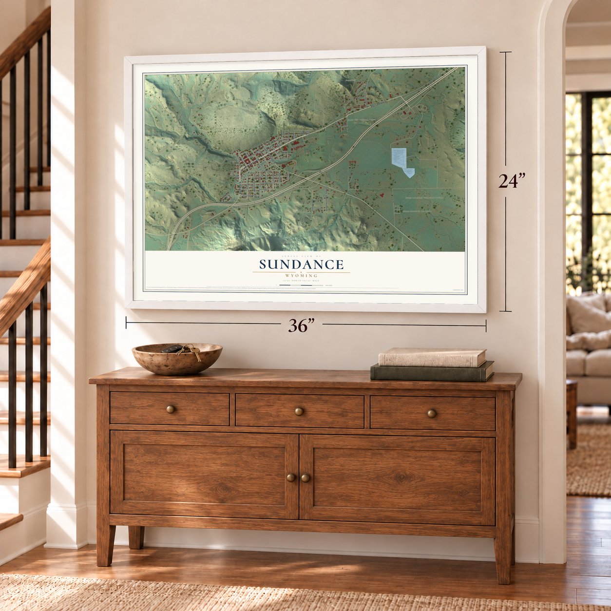 Sundance, Wyoming map, 24 x 36 inch print in a white frame above a dresser by a staircase