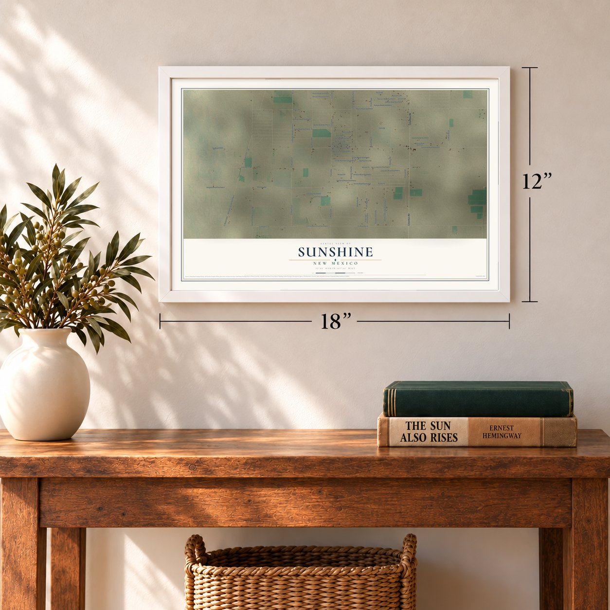Sunshine, New Mexico map, 12 x 18 inch print in a white frame in an entryway