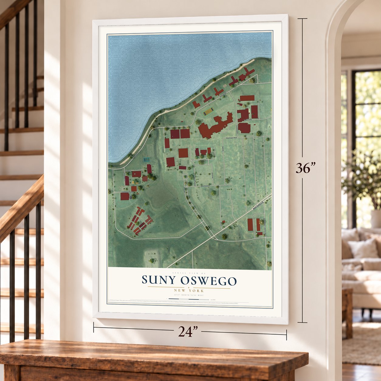 SUNY Oswego, New York map, 24 x 36 inch print in a white frame by a staircase