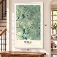 Sutton, Massachusetts map, 24 x 36 inch print in a white frame by a staircase