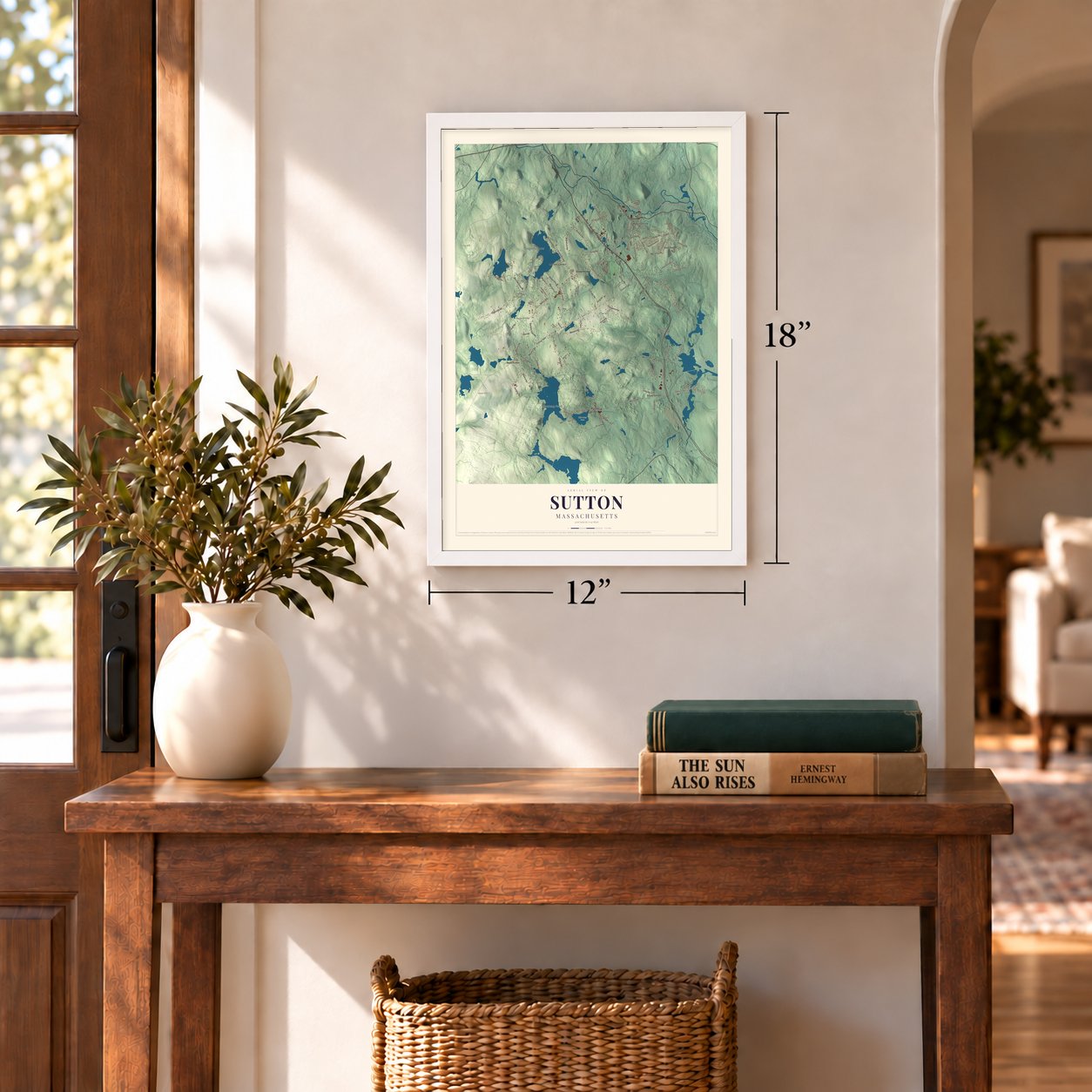 Sutton, Massachusetts map, 12 x 18 inch print in a white frame in an entryway