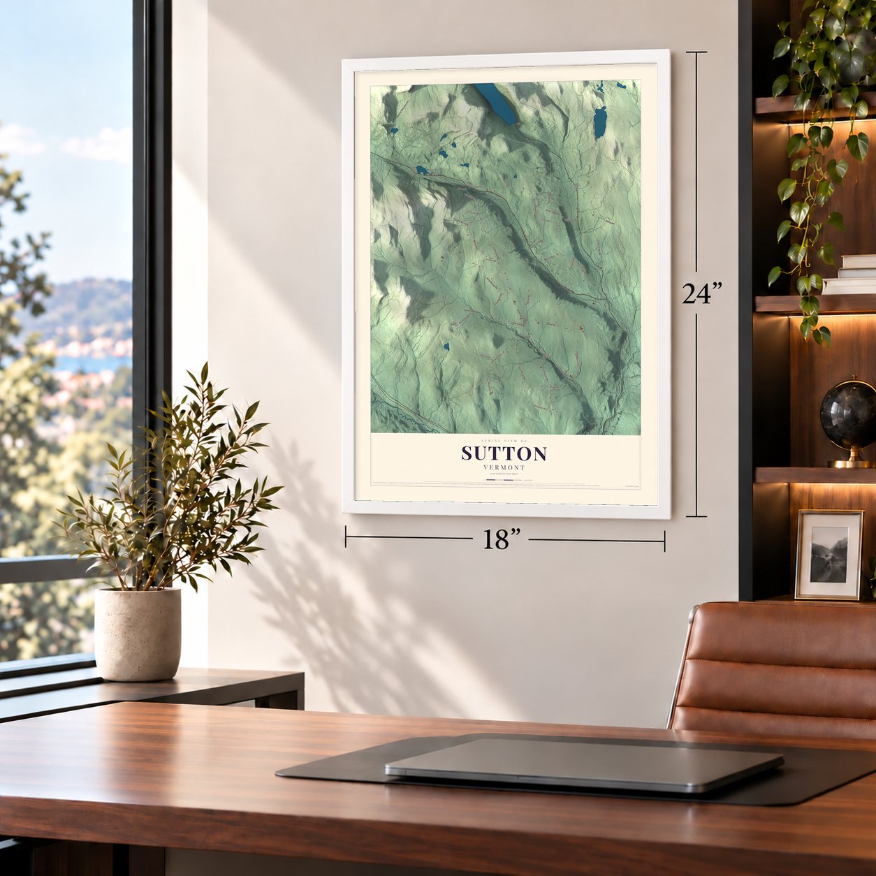 Sutton, Vermont map, 18 x 24 inch print in a white frame in a home office