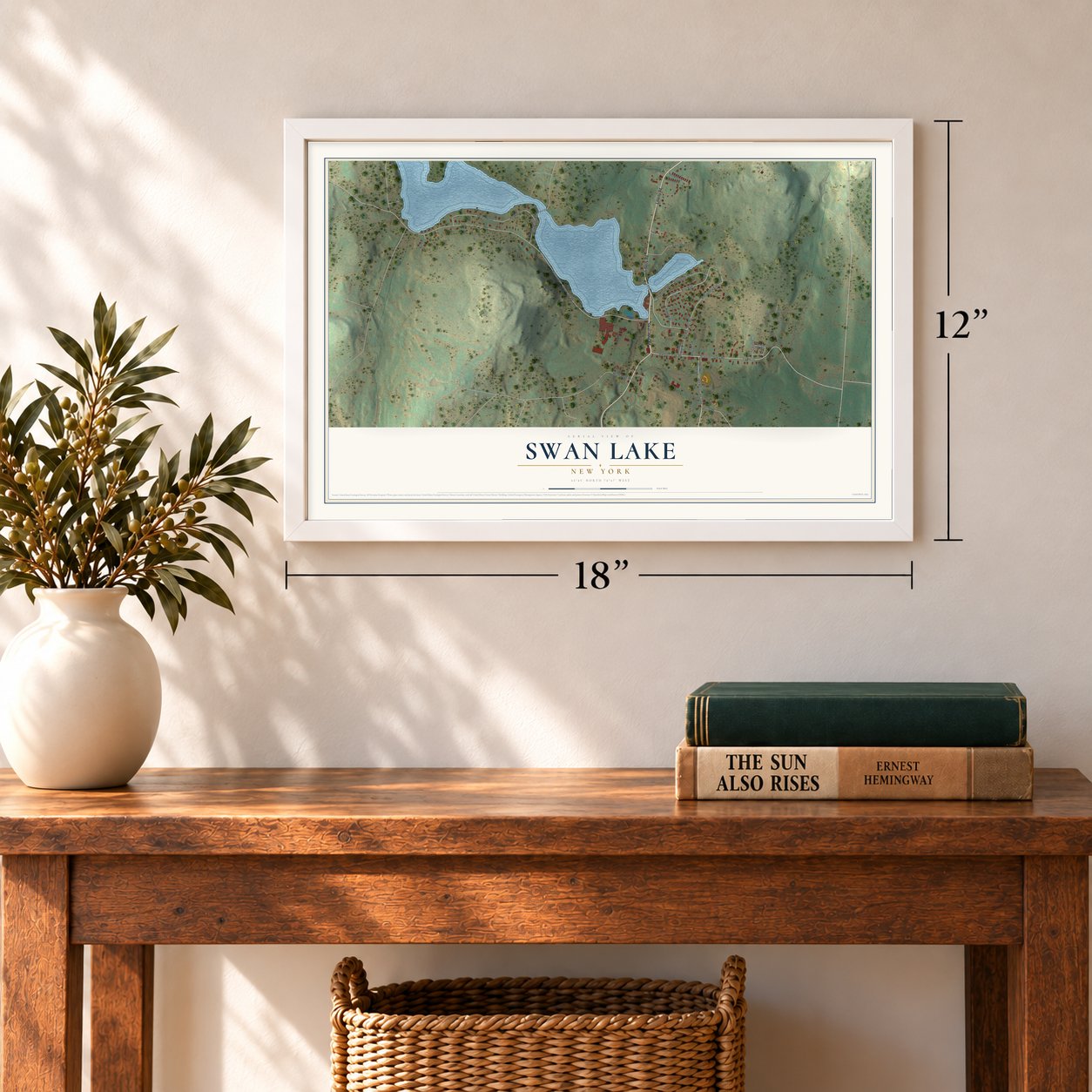 Swan Lake, New York map, 12 x 18 inch print in a white frame in an entryway