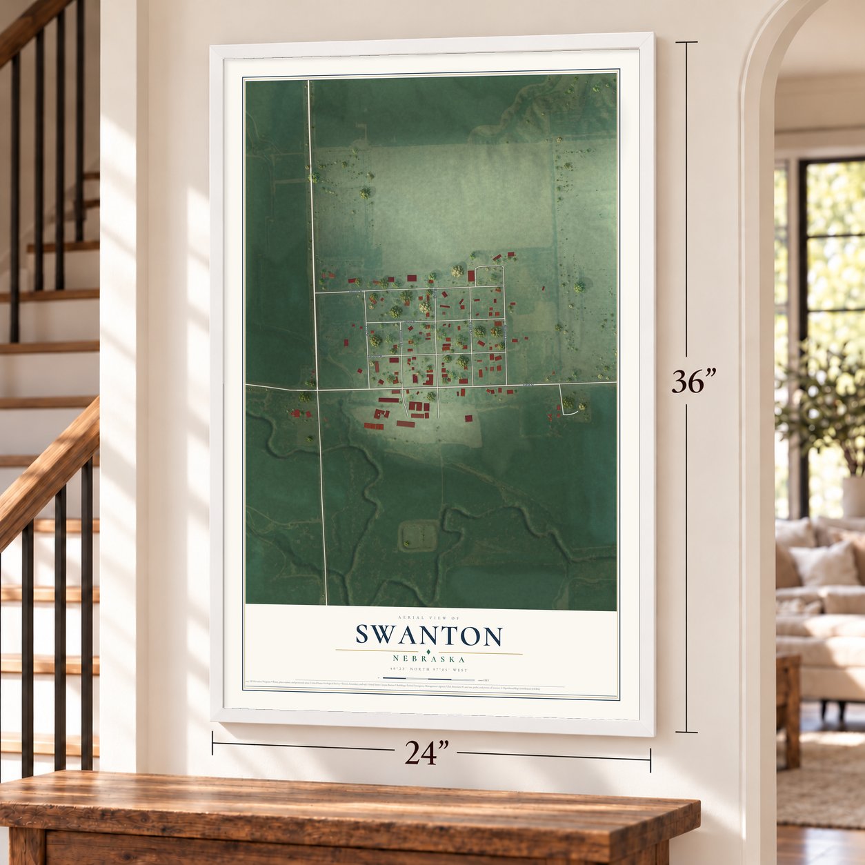 Swanton, Nebraska map, 24 x 36 inch print in a white frame by a staircase