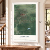 Swanton, Ohio map, 24 x 36 inch print in a white frame by a staircase