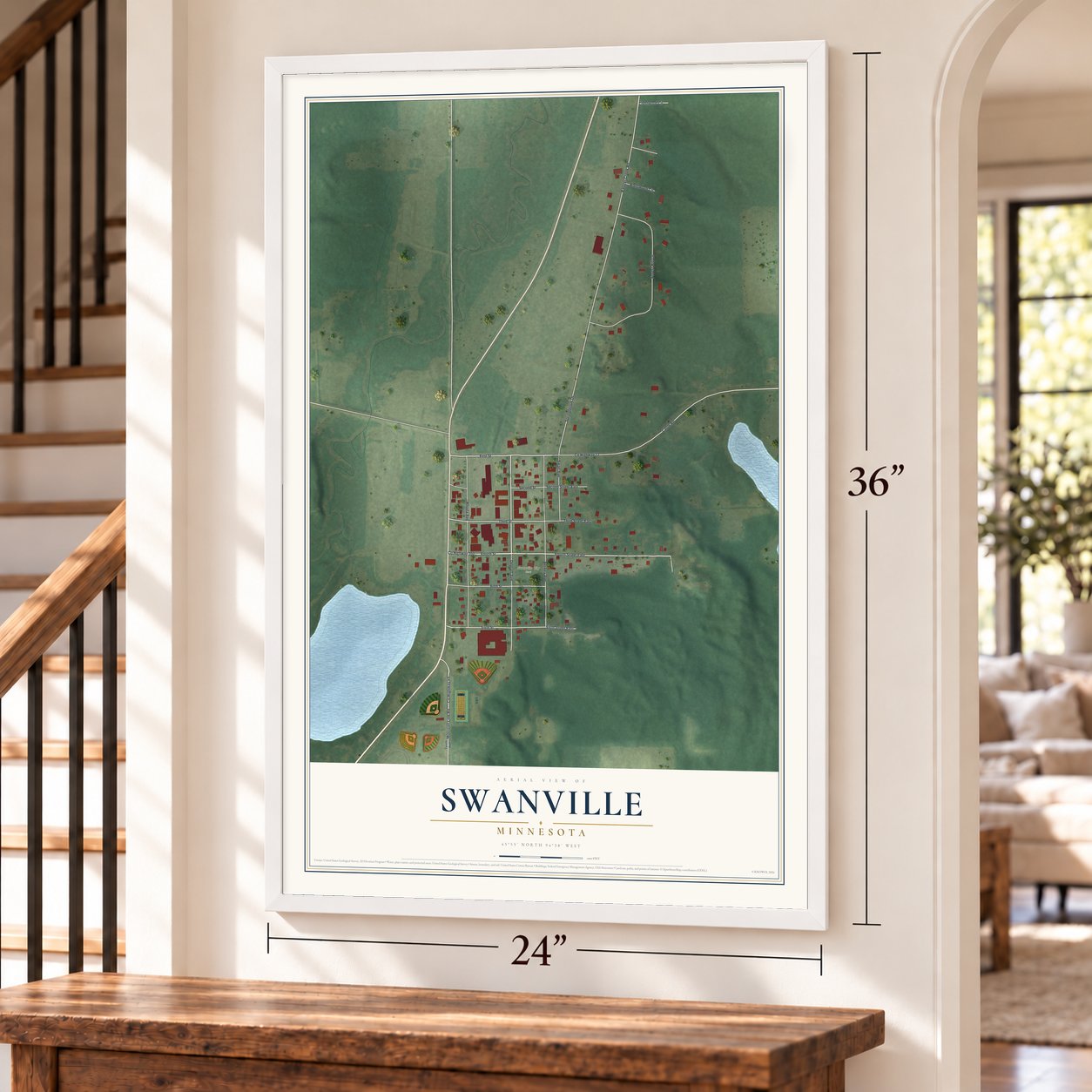 Swanville, Minnesota map, 24 x 36 inch print in a white frame by a staircase