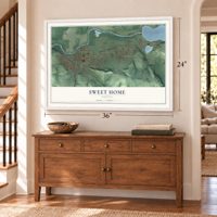 Sweet Home, Oregon map, 24 x 36 inch print in a white frame above a dresser by a staircase