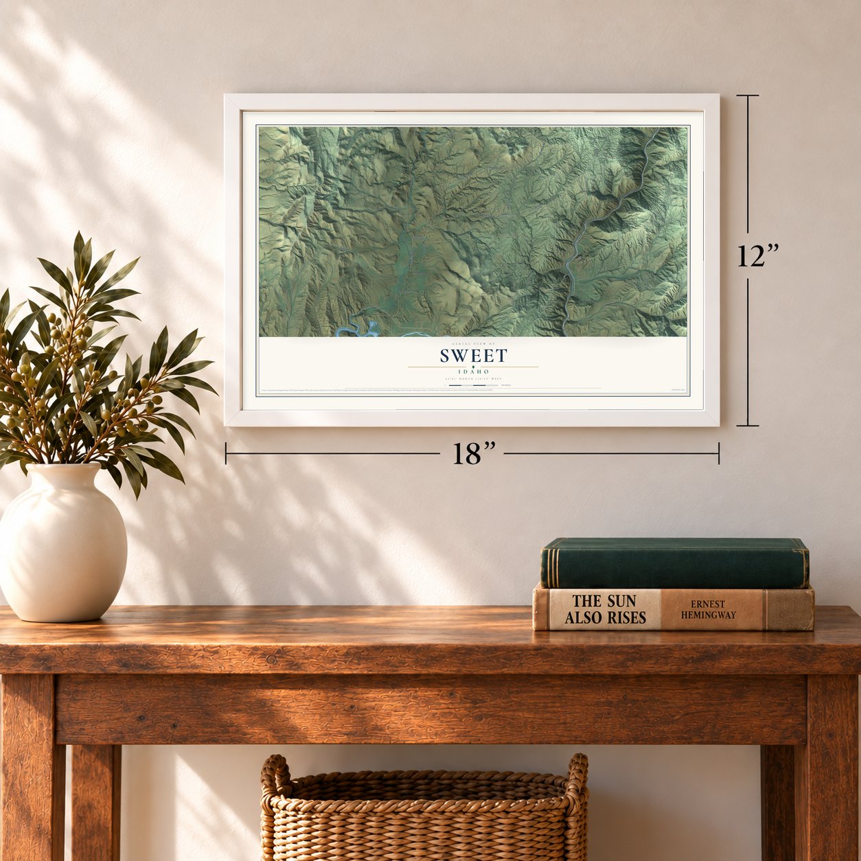 Sweet, Idaho map, 12 x 18 inch print in a white frame in an entryway