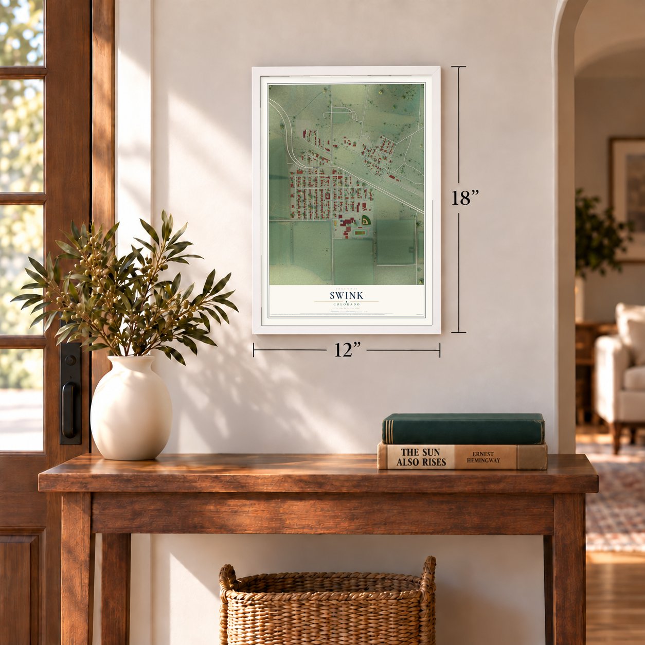Swink, Colorado map, 12 x 18 inch print in a white frame in an entryway