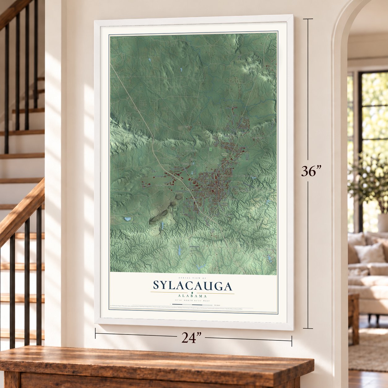 Sylacauga, Alabama map, 24 x 36 inch print in a white frame by a staircase