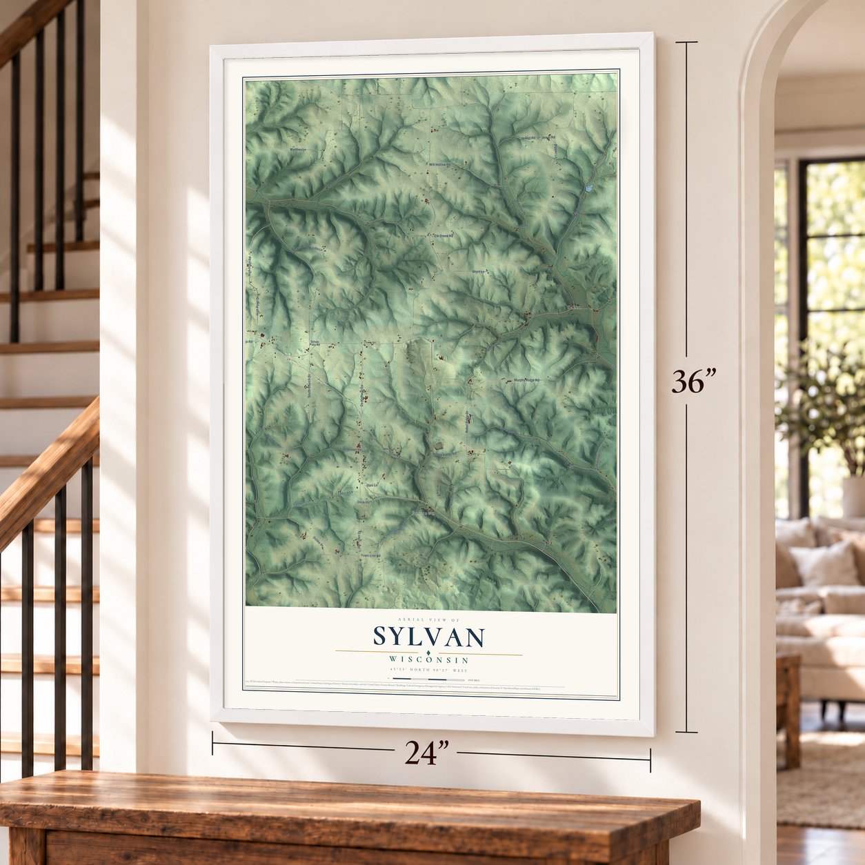 Sylvan, Wisconsin map, 24 x 36 inch print in a white frame by a staircase