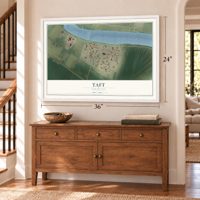 Taft, Louisiana map, 24 x 36 inch print in a white frame above a dresser by a staircase