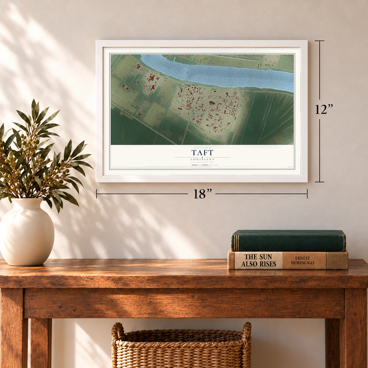 Taft, Louisiana map, 12 x 18 inch print in a white frame in an entryway