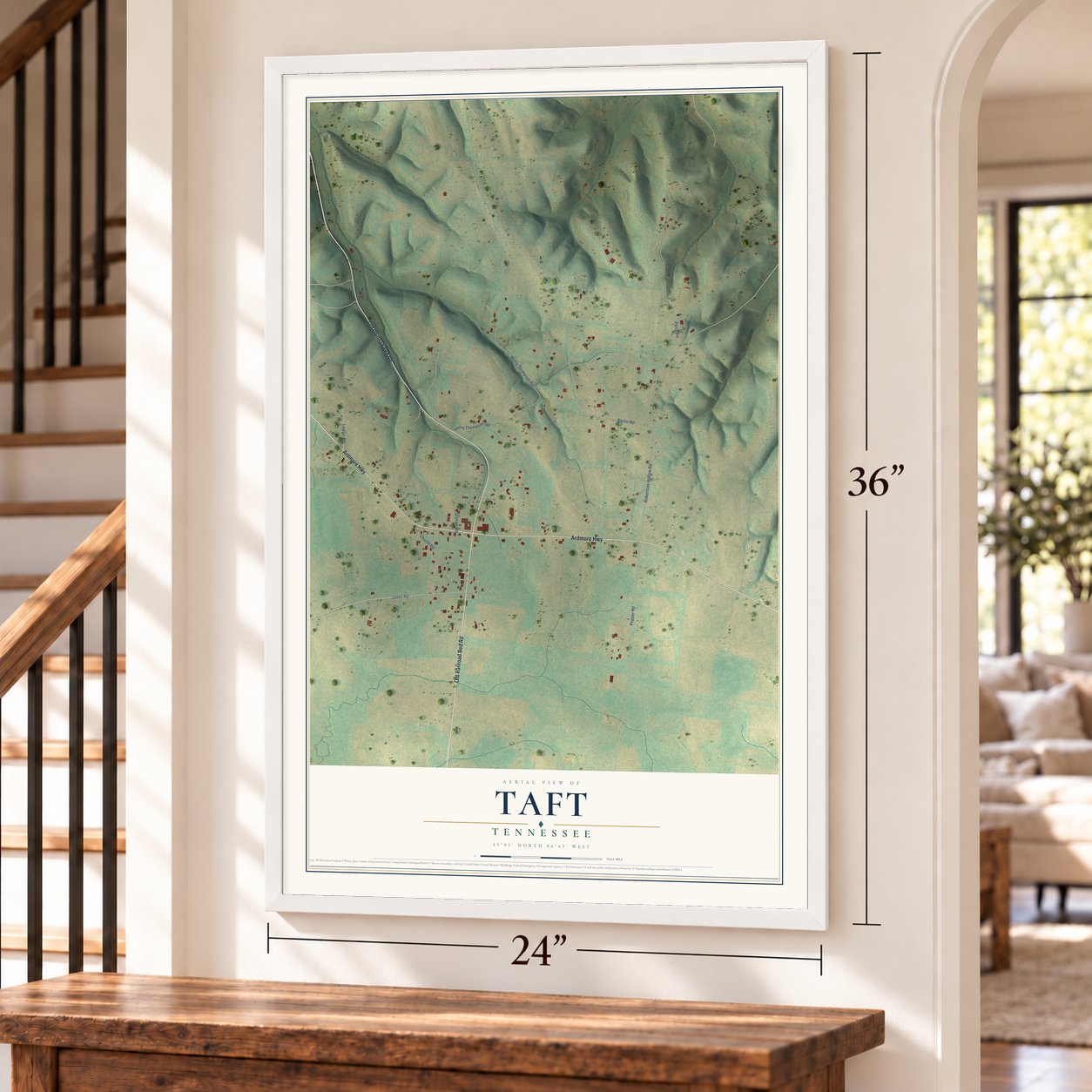 Taft, Tennessee map, 24 x 36 inch print in a white frame by a staircase