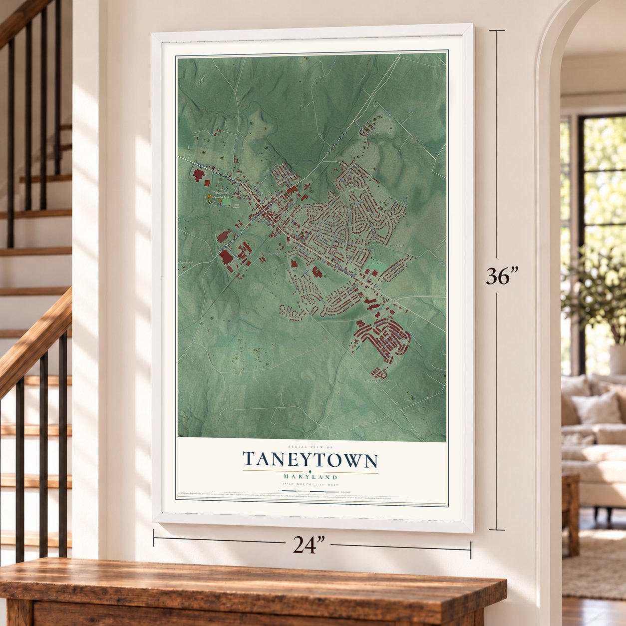 Taneytown, Maryland map, 24 x 36 inch print in a white frame by a staircase