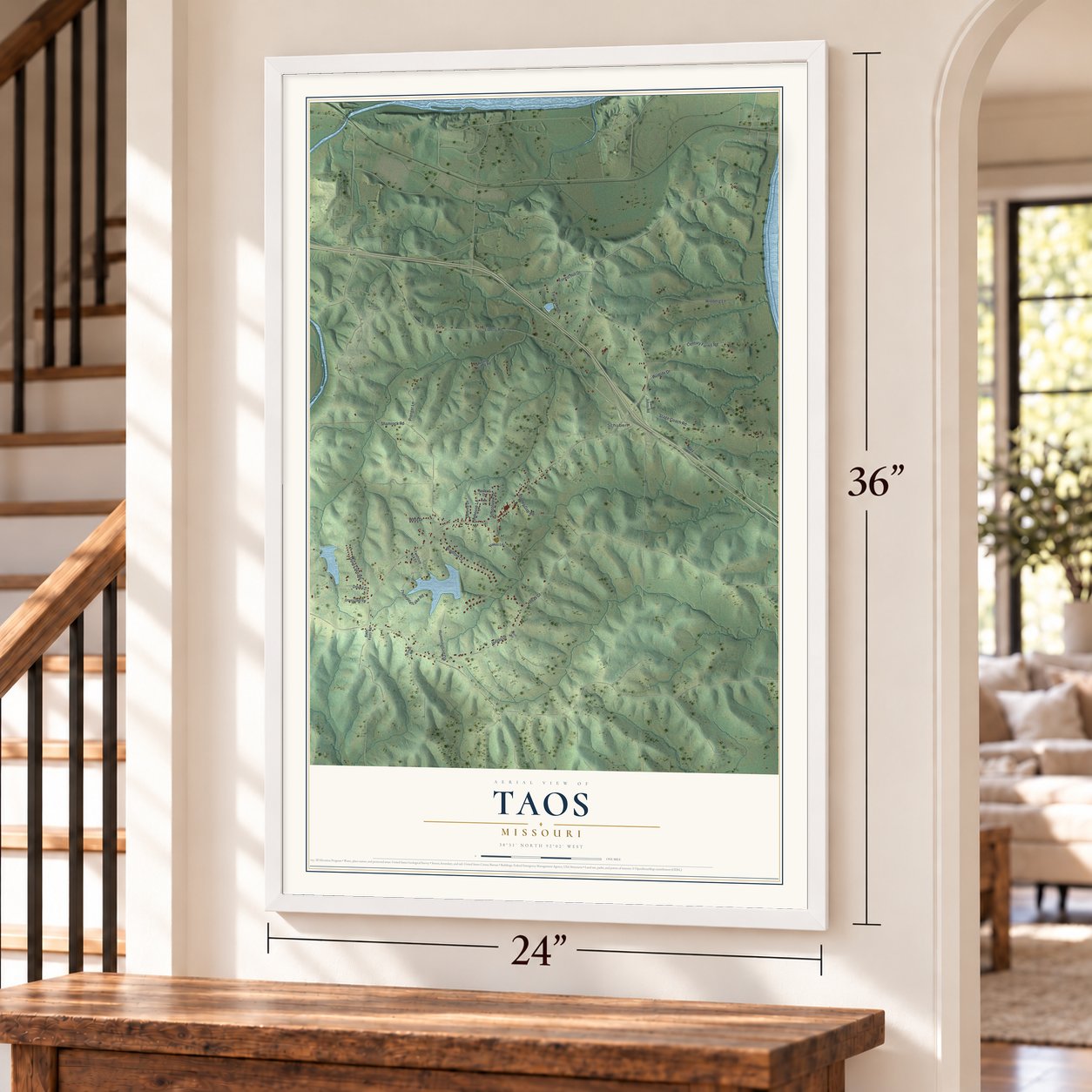 Taos, Missouri map, 24 x 36 inch print in a white frame by a staircase