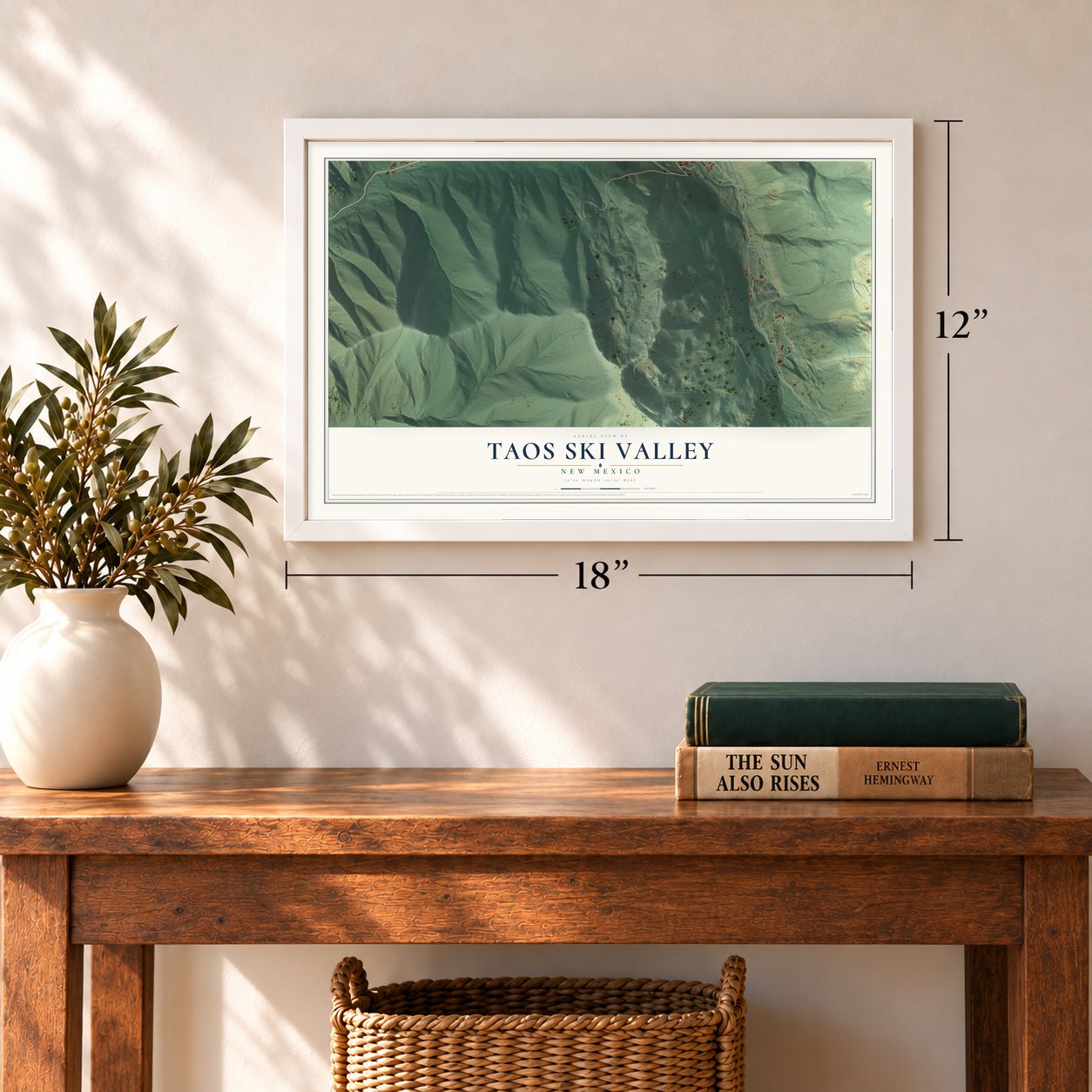 Taos Ski Valley, New Mexico map, 12 x 18 inch print in a white frame in an entryway