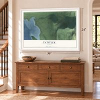 Tatitlek, Alaska map, 24 x 36 inch print in a white frame above a dresser by a staircase