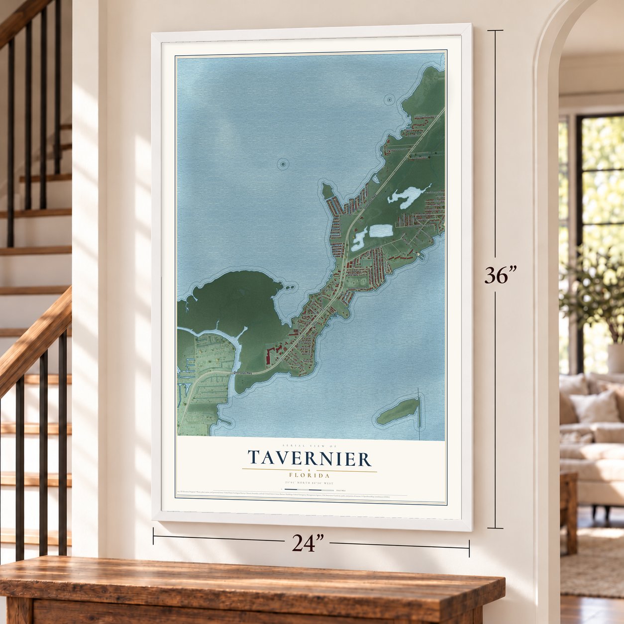 Tavernier, Florida map, 24 x 36 inch print in a white frame by a staircase