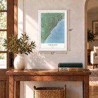 Tawas City, Michigan map, 12 x 18 inch print in a white frame in an entryway