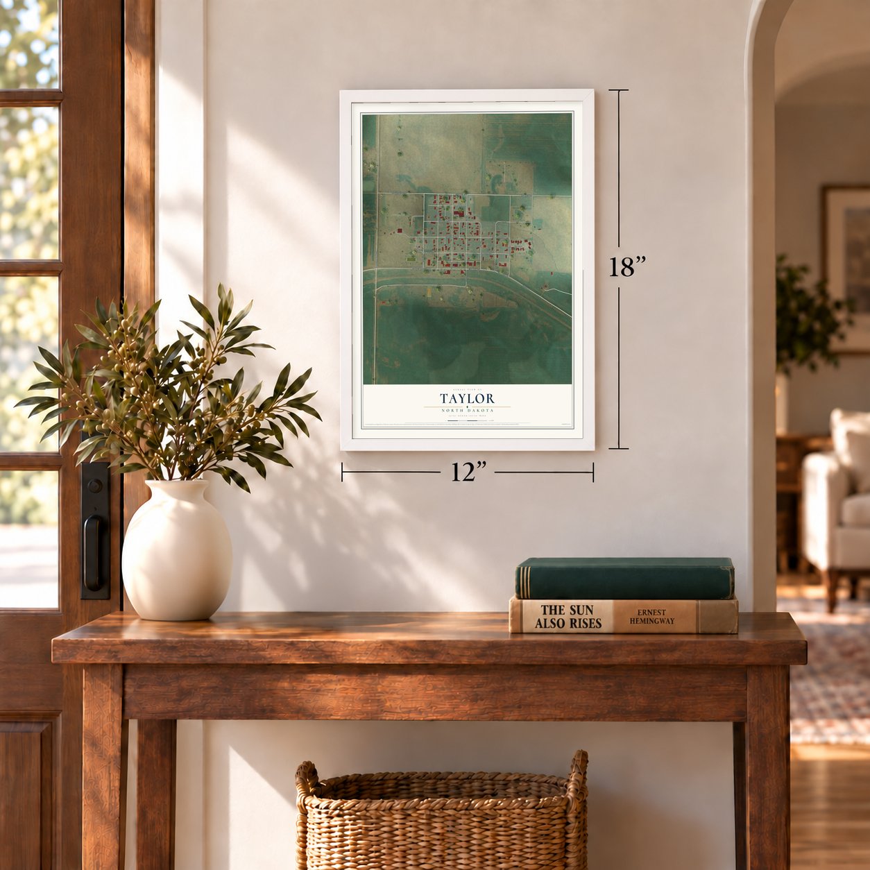 Taylor, North Dakota map, 12 x 18 inch print in a white frame in an entryway