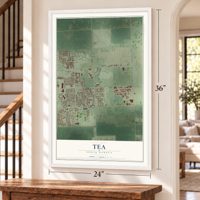 Tea, South Dakota map, 24 x 36 inch print in a white frame by a staircase