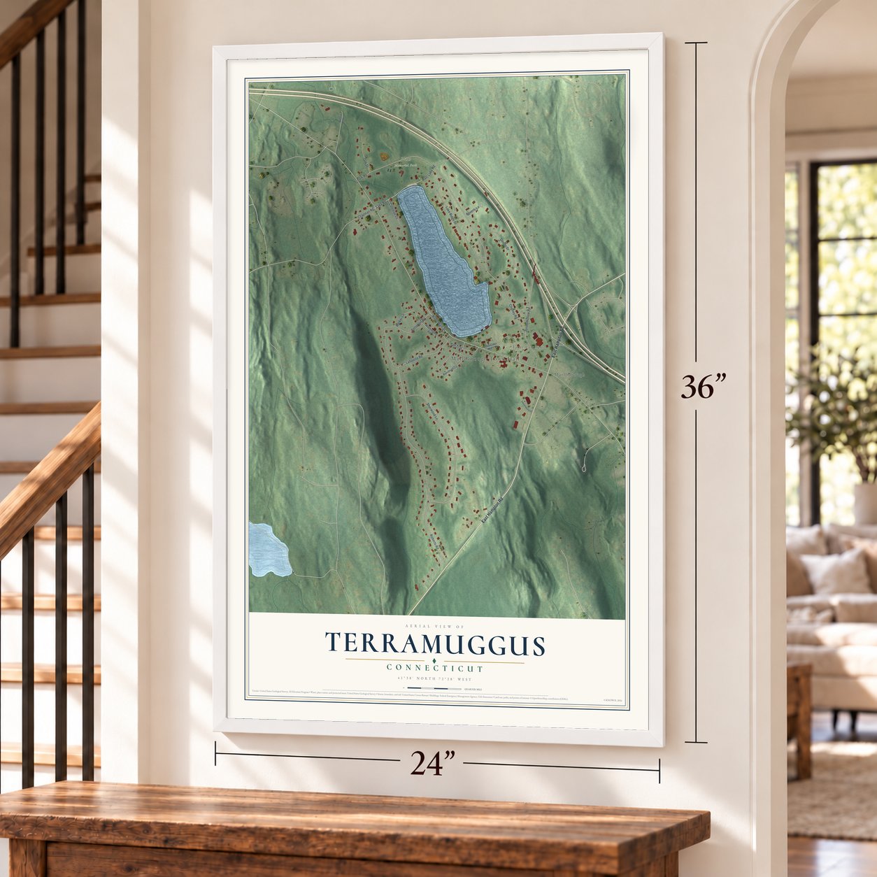 Terramuggus, Connecticut map, 24 x 36 inch print in a white frame by a staircase