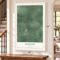 Thaxton, Mississippi map, 24 x 36 inch print in a white frame by a staircase