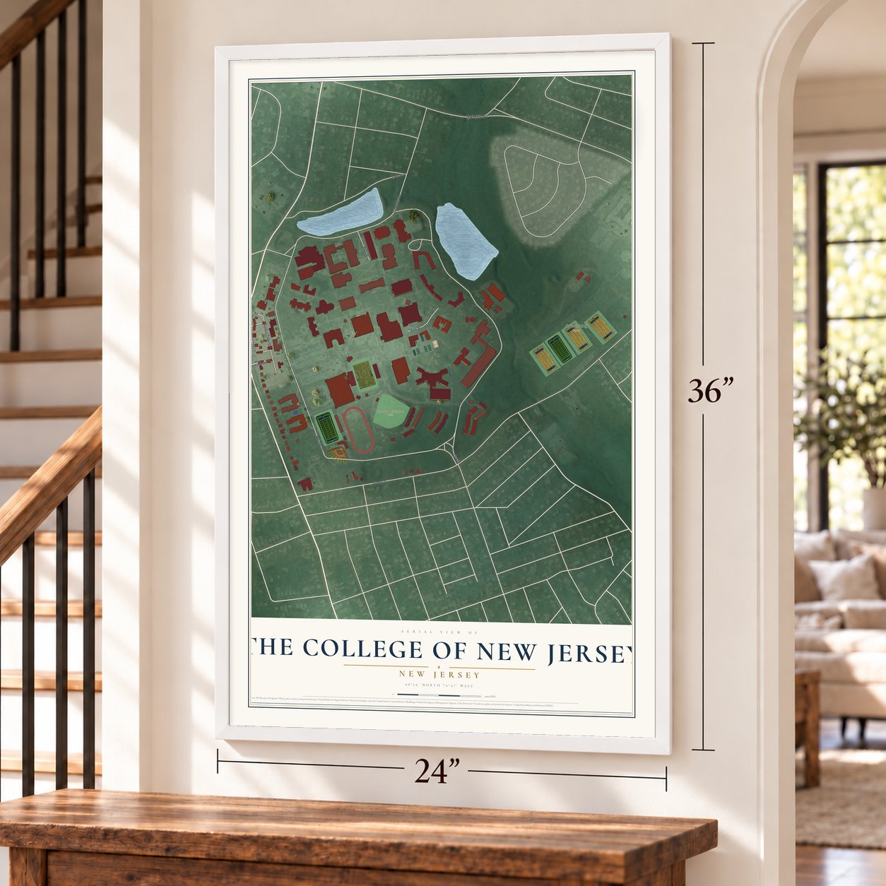 The College of New Jersey, New Jersey map, 24 x 36 inch print in a white frame by a staircase