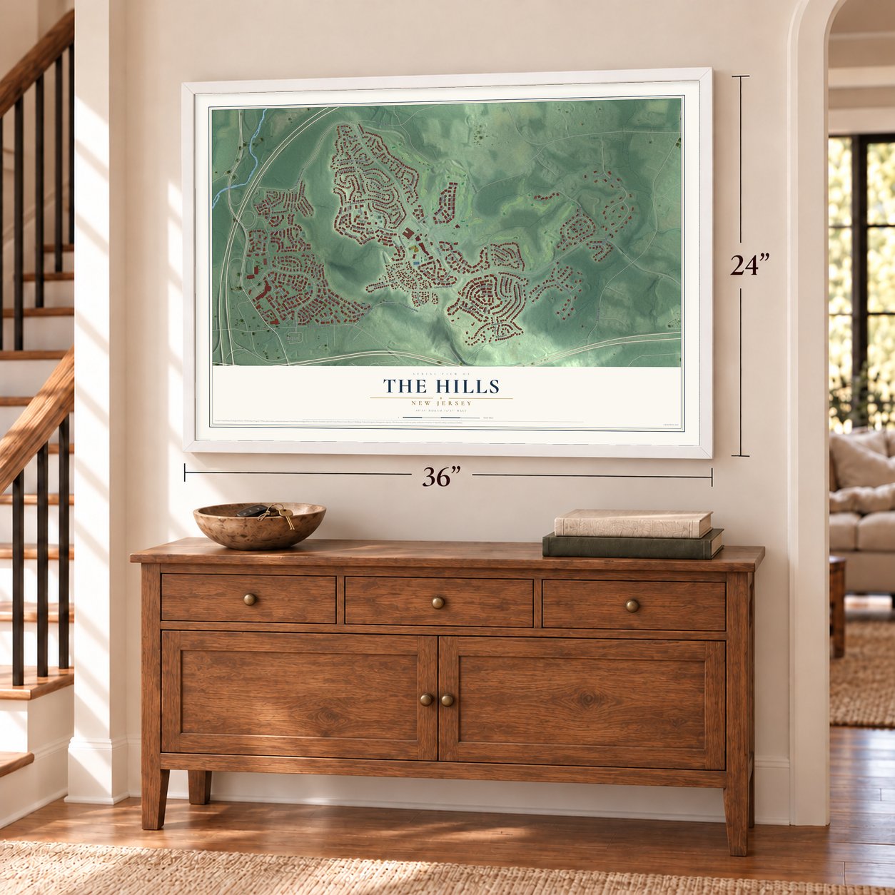 The Hills, New Jersey map, 24 x 36 inch print in a white frame above a dresser by a staircase