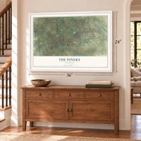 The Pinery, Colorado map, 24 x 36 inch print in a white frame above a dresser by a staircase